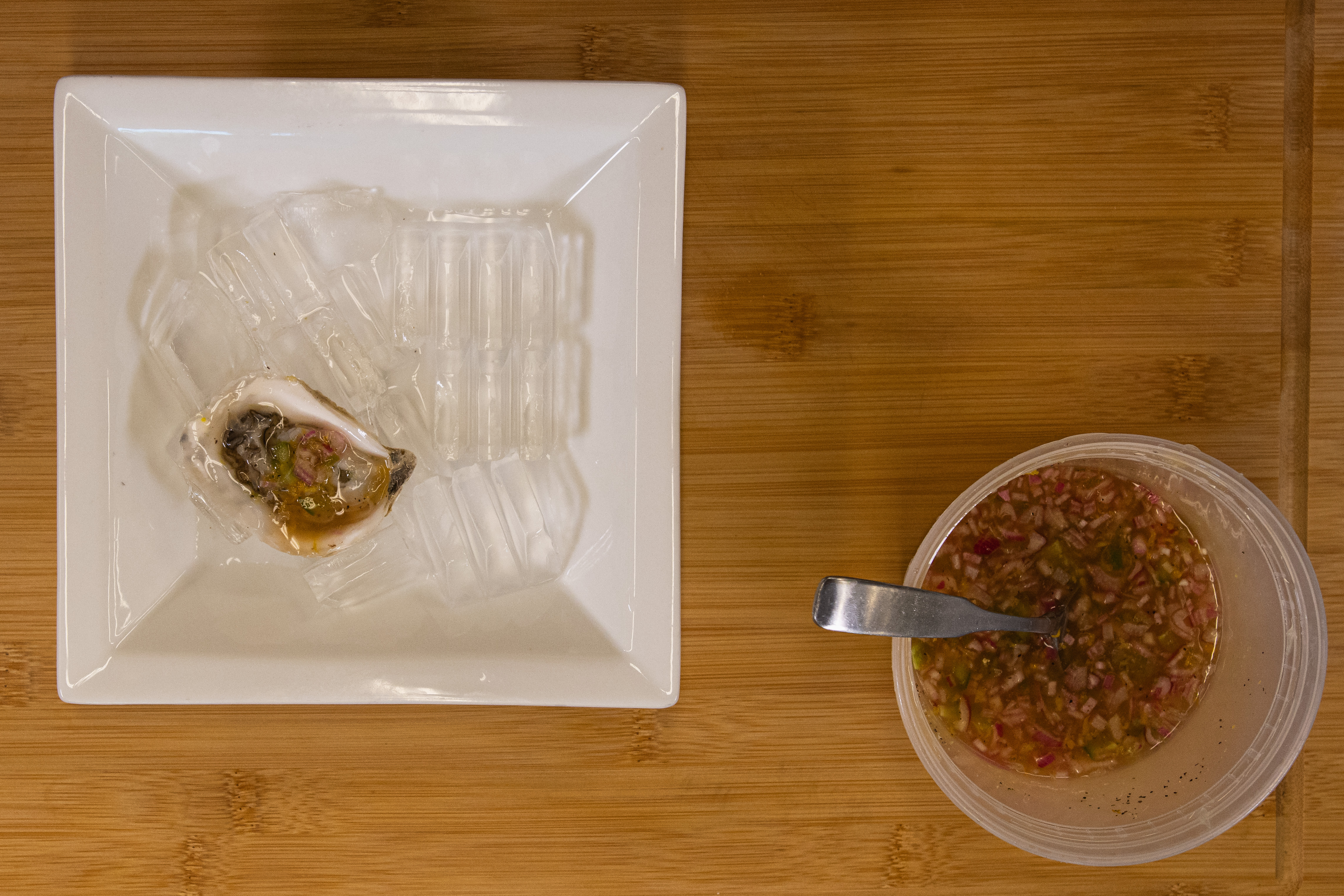 Citrus oyster mignonette on a cutting board.
