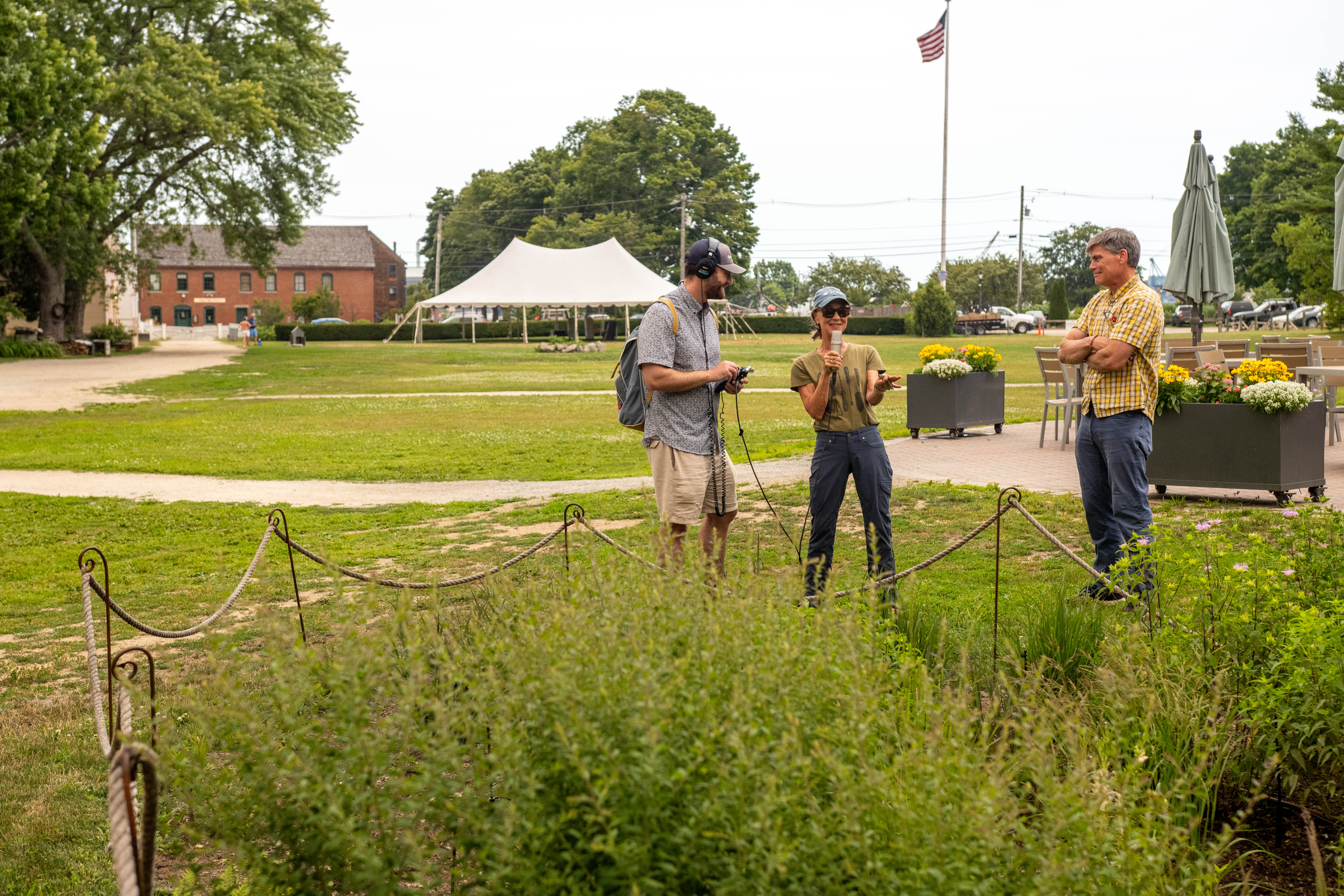 Brian and Erik interview Tamara near a rain garden at Strawbery Banke.