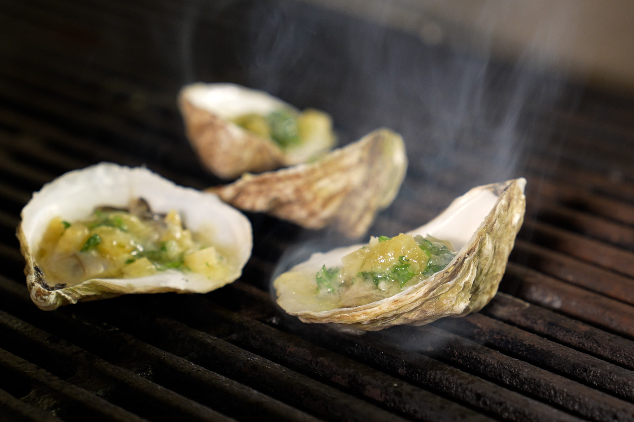 Oysters being grilled.