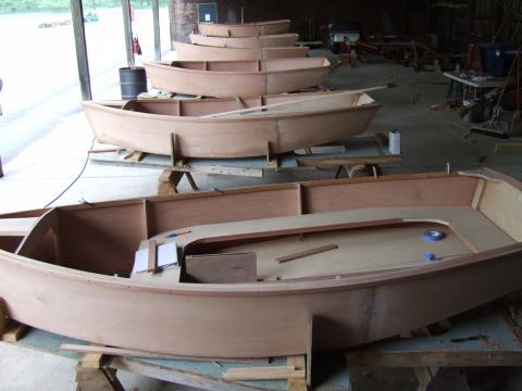 Day 3, boats face up on sawhorses