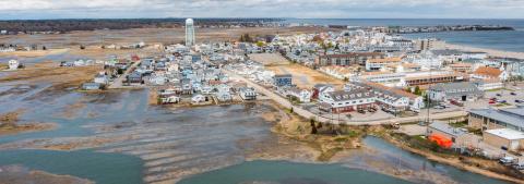 An aerial view of a coastal New Hampshire neighborhood experiencing high tide flooding.