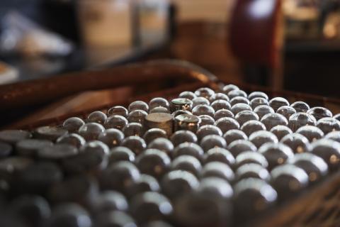 A close up photo of test tubes in their case.
