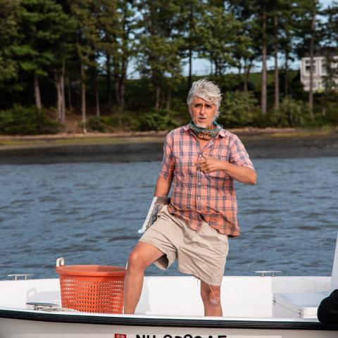 Steve Jones standing on a boat. 