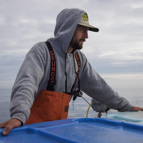 Linas Kenter on a fishing boat.